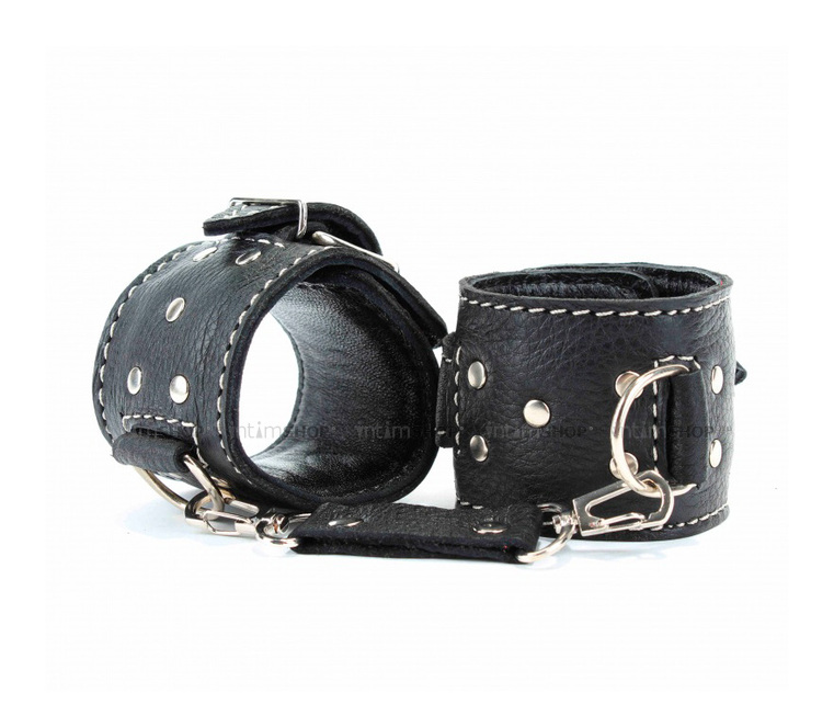 Кожаные наручники черные - фото 1